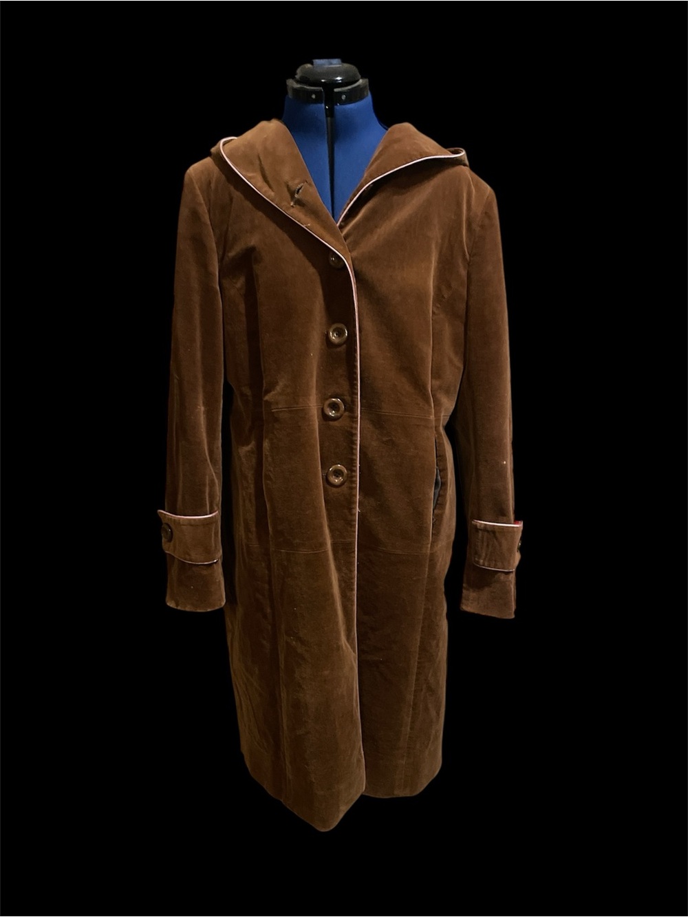 Vintage women’s brown corduroy coat with hood.